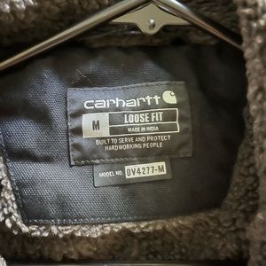 Mens carhartt black vest. Excellent vintage used condition. Bought wrong size!